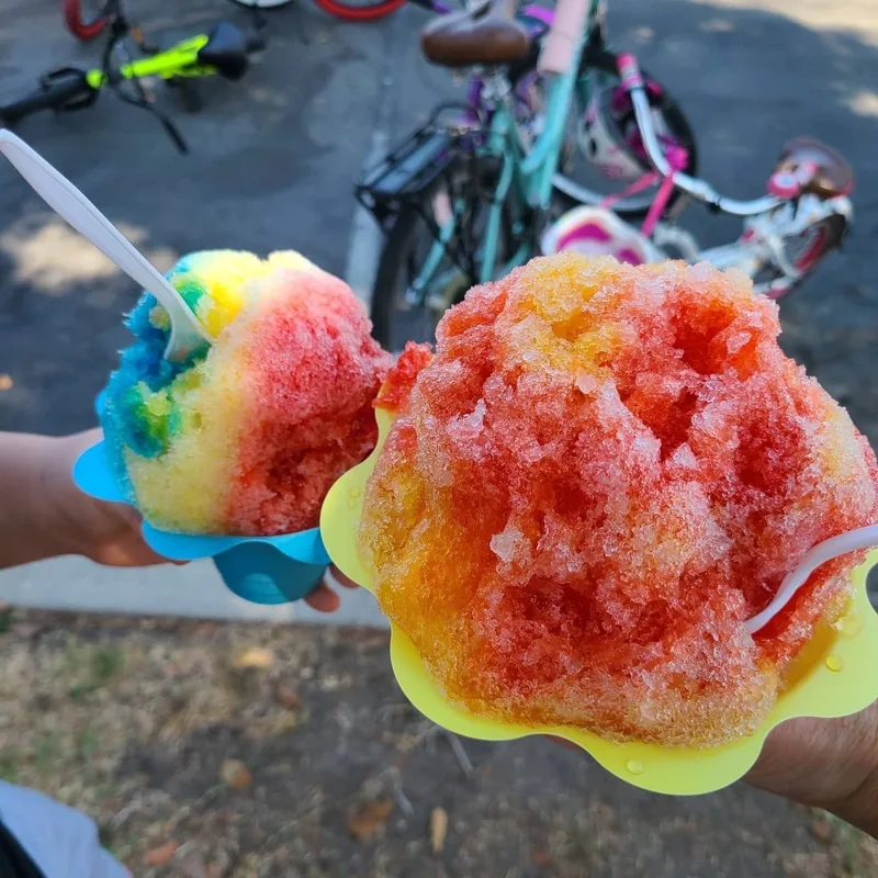 Two shave ice cups from Sweet Aloha